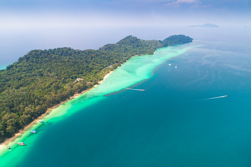Aerial view wide shot beautiful sunset tropical beach sea in south thailand Asia