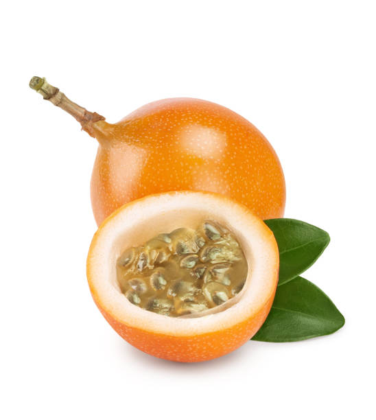 istock Granadilla or yellow passion fruit with leaf isolated on white background 1143927909
