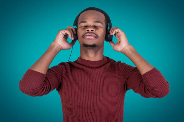 istock Black male enjoying good music 1143929412