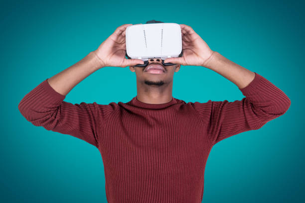 istock Serious black man in VR goggles 1143929589