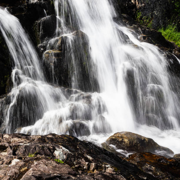 istock Vertical waterfall in rocks. Mountain river in mountains. 1143931385