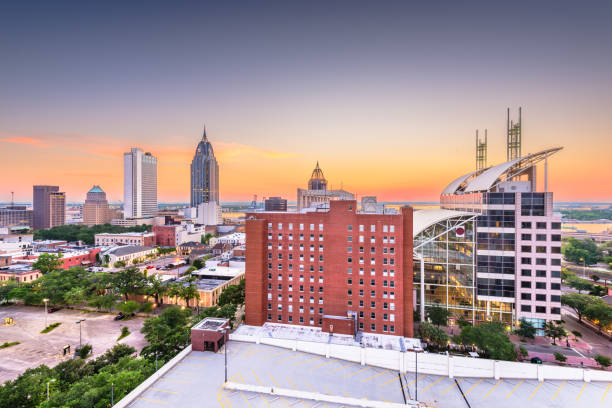 istock Mobile, Alabama, USA downtown skyline at dusk. 1143931387