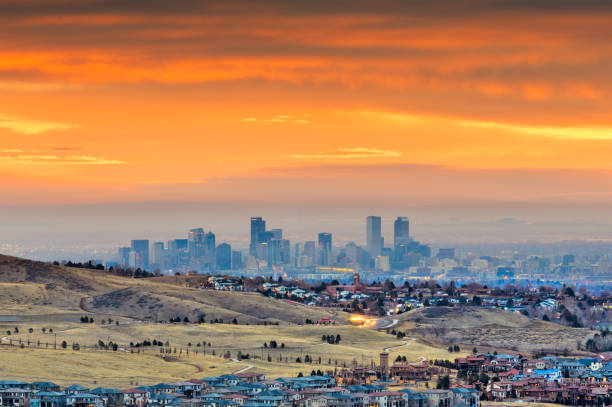 Denver, Colorado, USA downtown skyline viewed from Red Rocks Denver, Colorado, USA downtown skyline viewed from Red Rocks at dawn. denver photos stock pictures, royalty-free photos & images