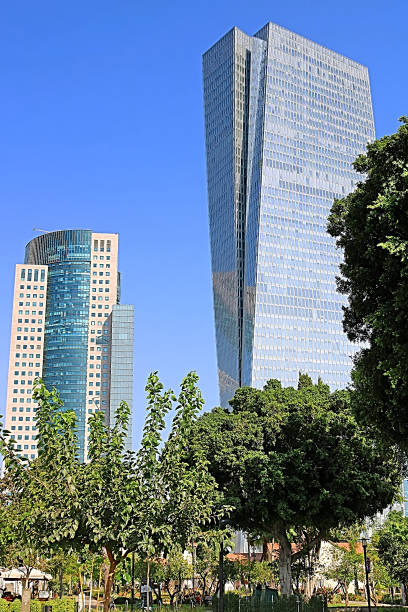 View of skyscrapers AfiSquare Tower (left) and Azrieli Sarona Tower (right) from Sarona open air commercial center in Tel Aviv, Israel stock photo