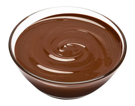 glass bowl of chocolate cream or melted chocolate isolated on white background