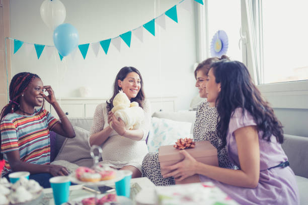 baby shower party - baby shower women home interior indoors fotografías e imágenes de stock