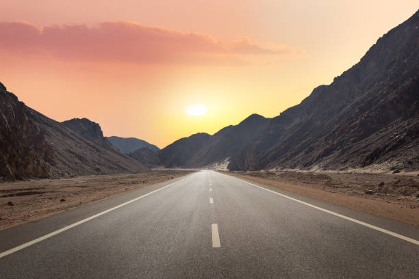istock Sunrise over road in Egypt 1143935690