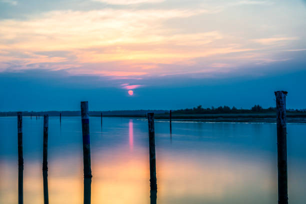 istock summer twilight over Bibione beach, Venice, Italy 1143940782