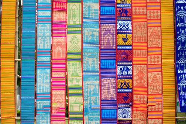 istock buatiful thai fabric in thai festival background 1143941699