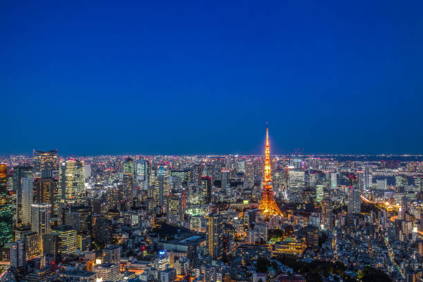 istock tokyo tower and tokyo skyline 1143942592