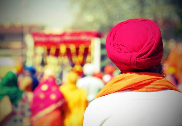 istock Sikh man with turbant with old toned effect 1143944557