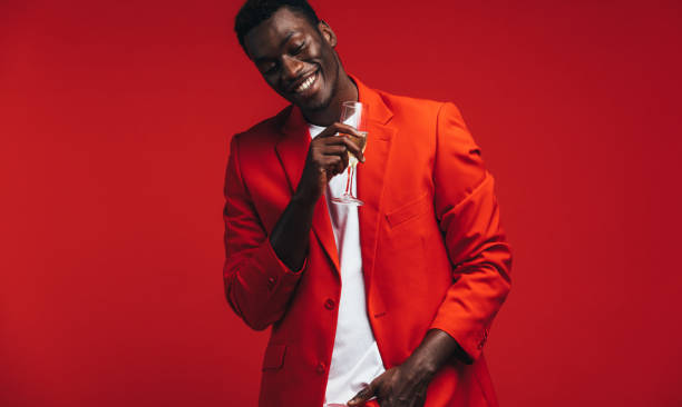 istock African man celebrating a special occasion with champagne 1143946609