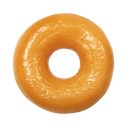 Donut con acristalamiento aislado sobre fondo blanco. Una rosquilla redonda de esmalte amarillo brillante. Vista frontal. Vista superior photo