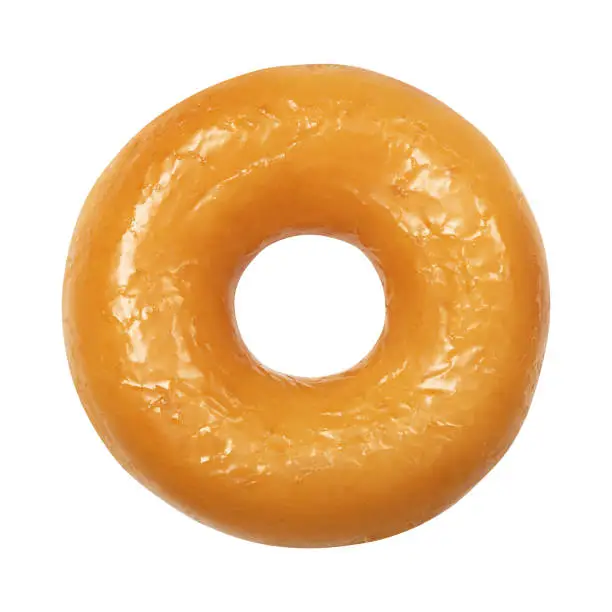 Photo of Donut with glazed isolated on white background. One round glossy yellow glaze doughnut. Front View. Top view