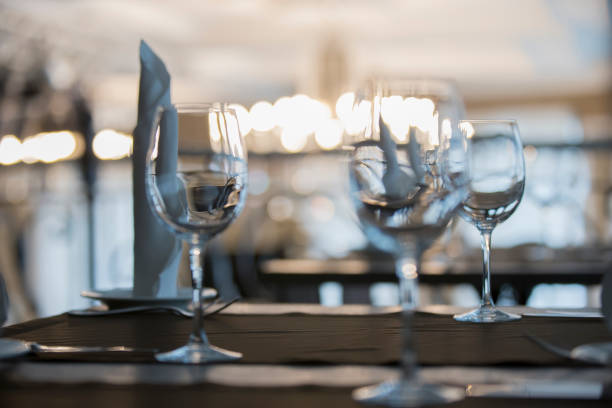 istock Glass goblets on the restaurant table. 1143947580