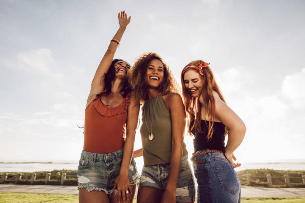 istock Friends dancing on summer vacation 1143948770