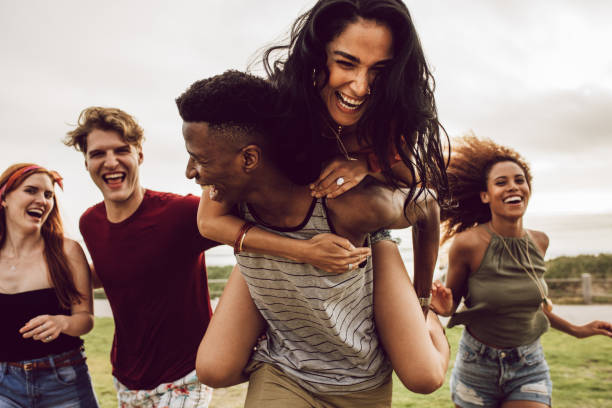 istock Smiling group of friends enjoying on weekend 1143949807