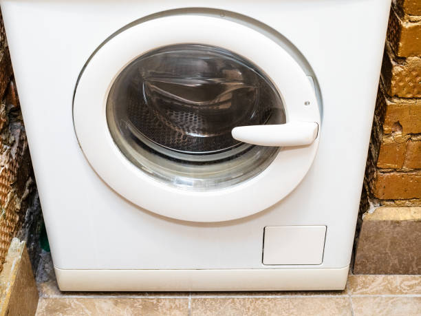 istock old washing machine in a brick niche in walls 1143950961