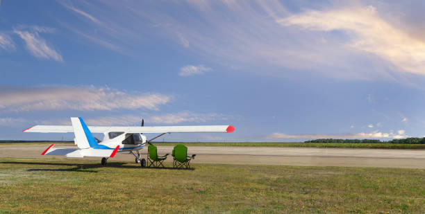 istock Light aircraft on the airfield 1143952325