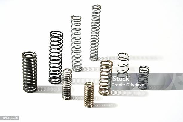 Spring Has Sprung Coil Springs On White Stock Photo - Download Image Now - Coiled Spring, Physical Pressure, Metal