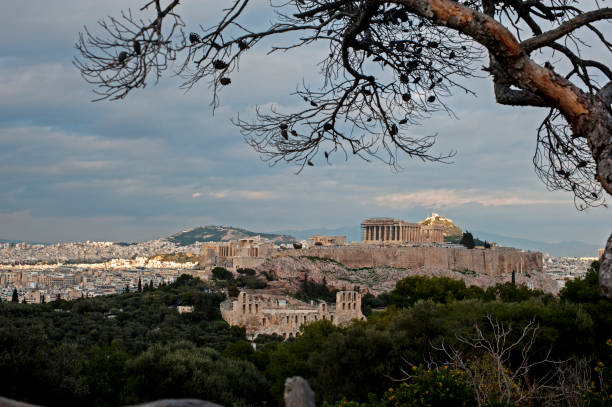 istock The Athens Acropolis and Cityscape with Dramatic Sky and Clouds 1143959078