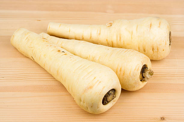 istock Parsnips On Wooden Background 114396655