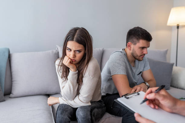 istock Young couple having marriage counselling 1143967296