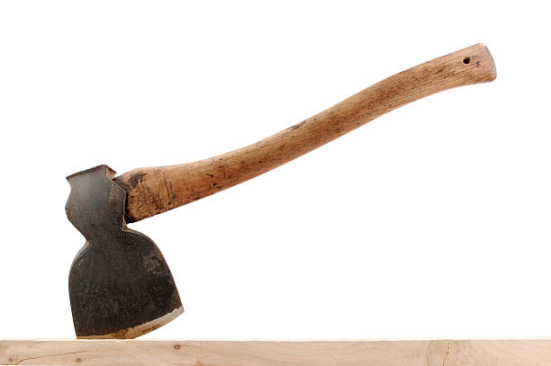Axe Stuck In Wood  axe photos stock pictures, royalty-free photos & images