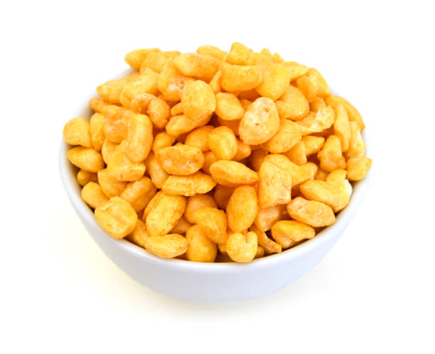 istock Corn cereals in white bowl isolated on white background 1143972753