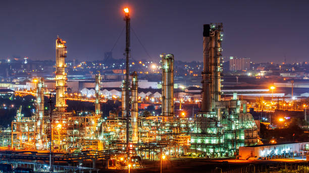 Oil refinery and​ industrial​ city​ After sunset Oil refinery and​ industrial​ city​ After sunset oilsands stock pictures, royalty-free photos & images