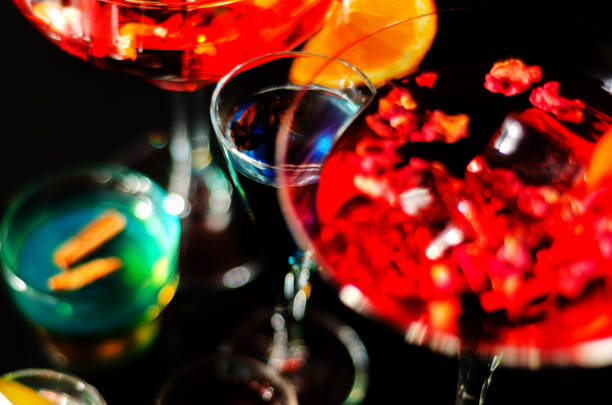 Tasty and colorful drinks based on various alcohols, syrups and liqueurs, unique effect of the bartender's work