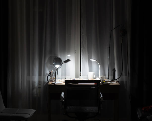 istock workplace in the room with the lamp on 1143974781