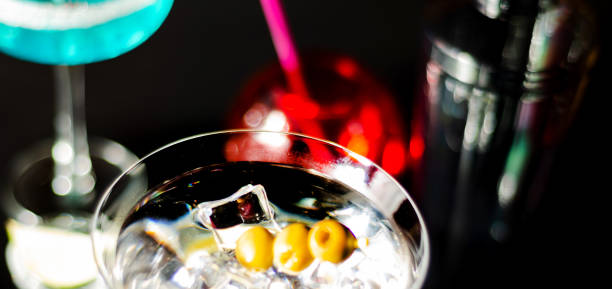 istock Tasty and colorful drinks based on various alcohols, syrups and liqueurs, unique effect of the bartender's work 1143975310