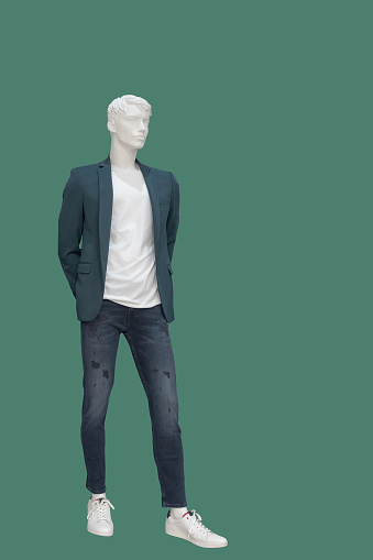 Full-length male mannequin dressed fashionable clothes, isolated. No brand names or copyright objects.