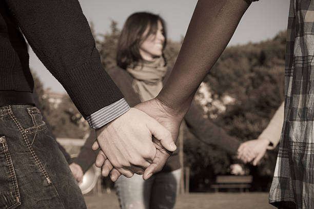 istock Group of Smiling College Students in Circle 114397726