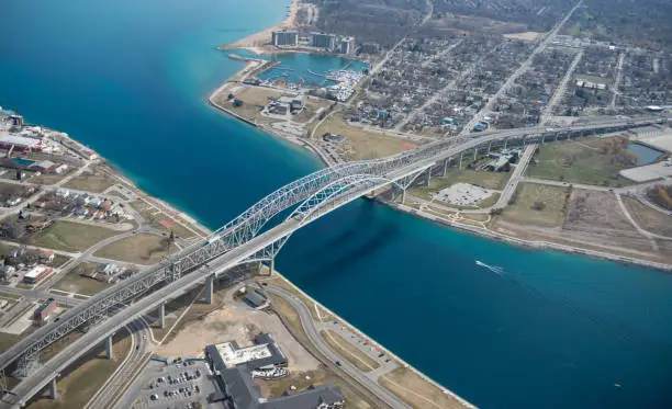 Aerial view of Blue Water Bridge spanning Port Huron Michigan and Point Edward and Sarnia Ontario