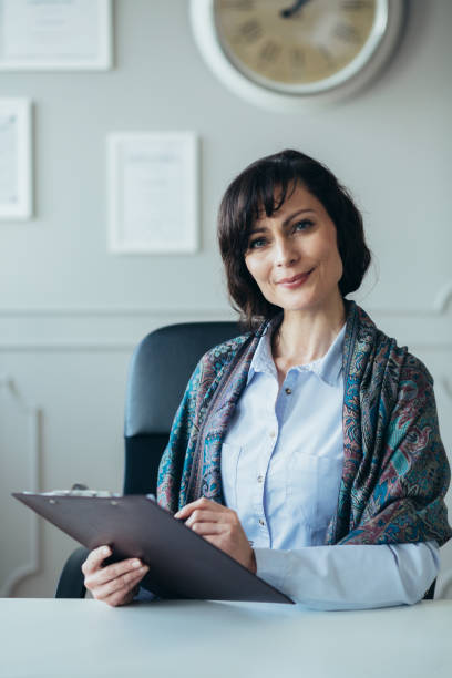 istock Vertical view of psychotherapist at her office 1143980643