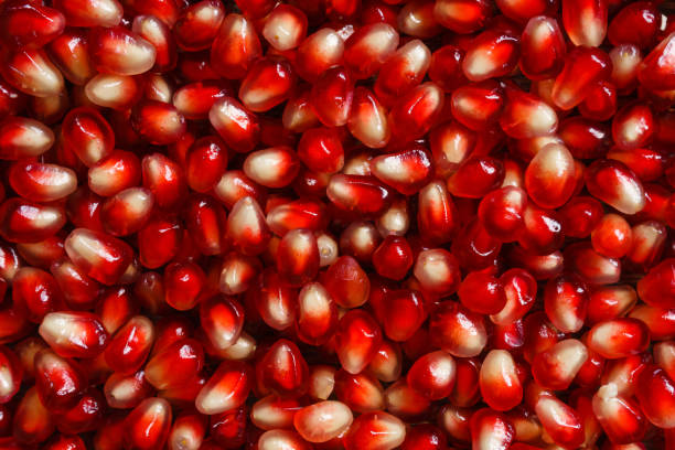 istock background - ripe pomegranate seeds