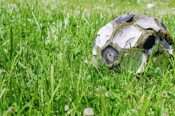 サッカーボールクローズアップ - soccer field dirty soccer outdoors ストックフォトと画像