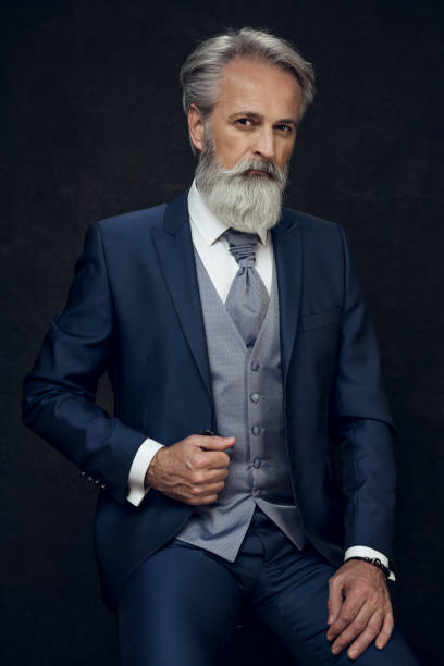 istock Dapper Gentleman having fashion photoshooting in studio 1143990360
