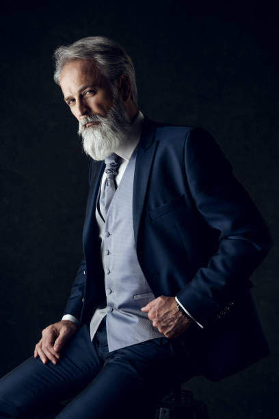 istock Dapper Gentleman having fashion photoshooting in studio 1143990365