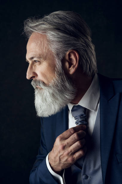 istock Dapper Gentleman having fashion photoshooting in studio 1143990366