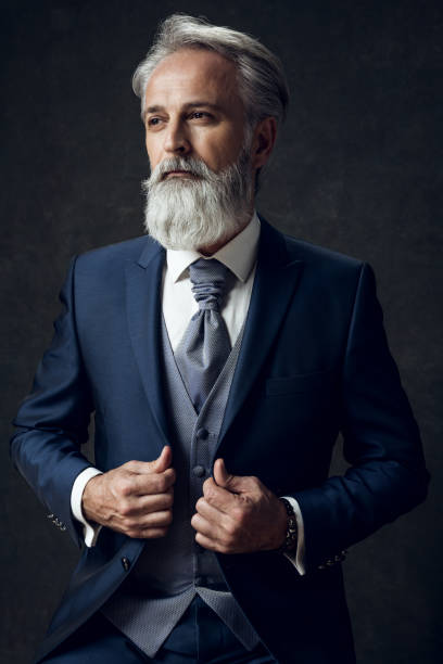 istock Dapper Gentleman having fashion photoshooting in studio 1143990369
