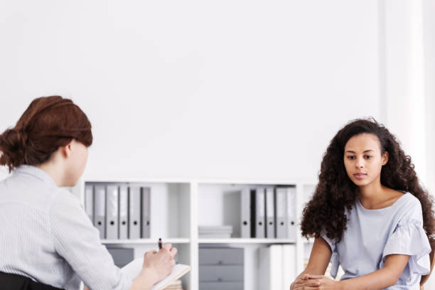 istock Sad african american girl with social problems during psychotherapy 1143990461