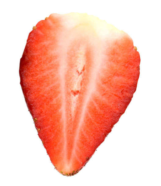 istock Half of strawberry isolated on white background. 1143991810