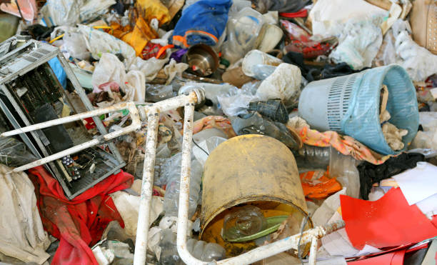istock broken bike and a broken personal computer in the junkyard 1143992657