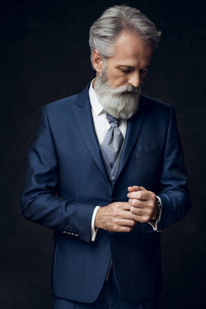 istock Dapper Gentleman having fashion photoshooting in studio 1143995483