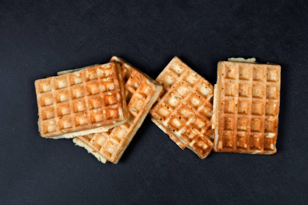 istock Belgium waffers on black board background. 1143996298