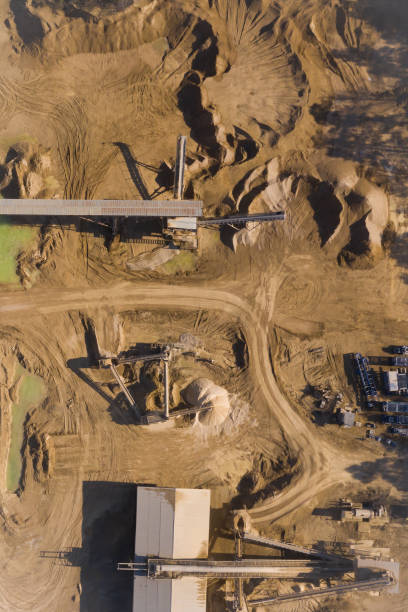 istock Aerial view of opencast mining quarry. Industrial place view from above 1143997189
