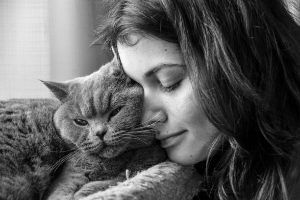 istock Woman and her cat 1144001839